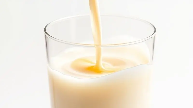 Imagem conceitual mostrando o que é o colostro bovino, um líquido dourado e nutritivo sendo misturado ao leite, simbolizando sua riqueza nutricional.